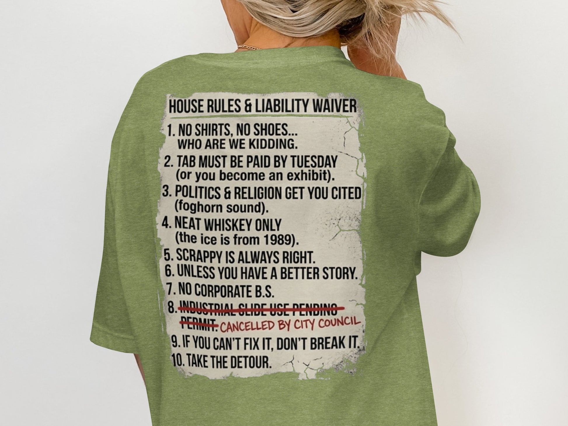 T-shirt with "House Rules & Liability Waiver" list printed on the back.