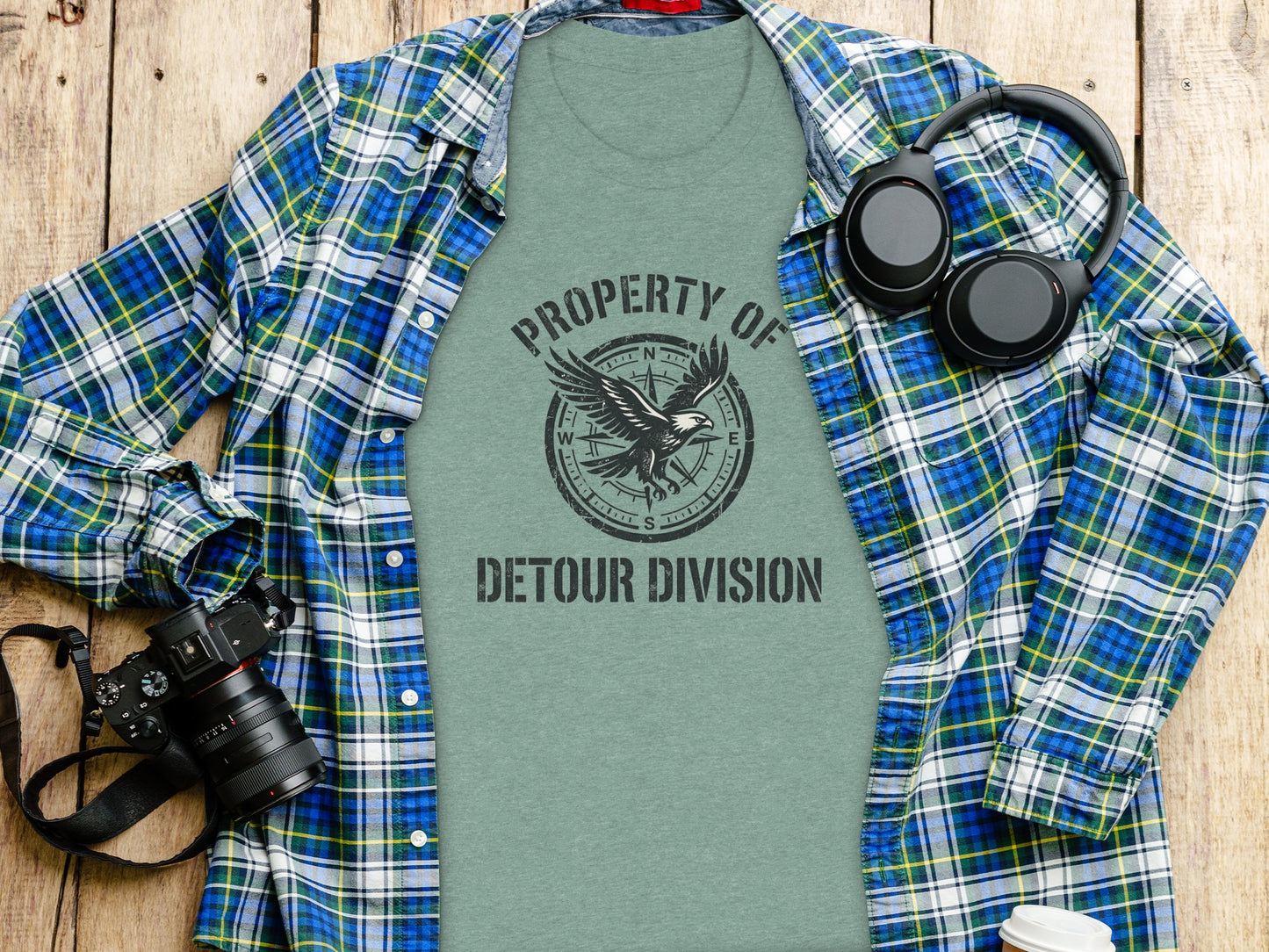 Rugged Detour Division Compass Eagle Tee Wilderness Shirt: Green t-shirt with "PROPERTY OF DETOUR DIVISION" text and compass graphic.