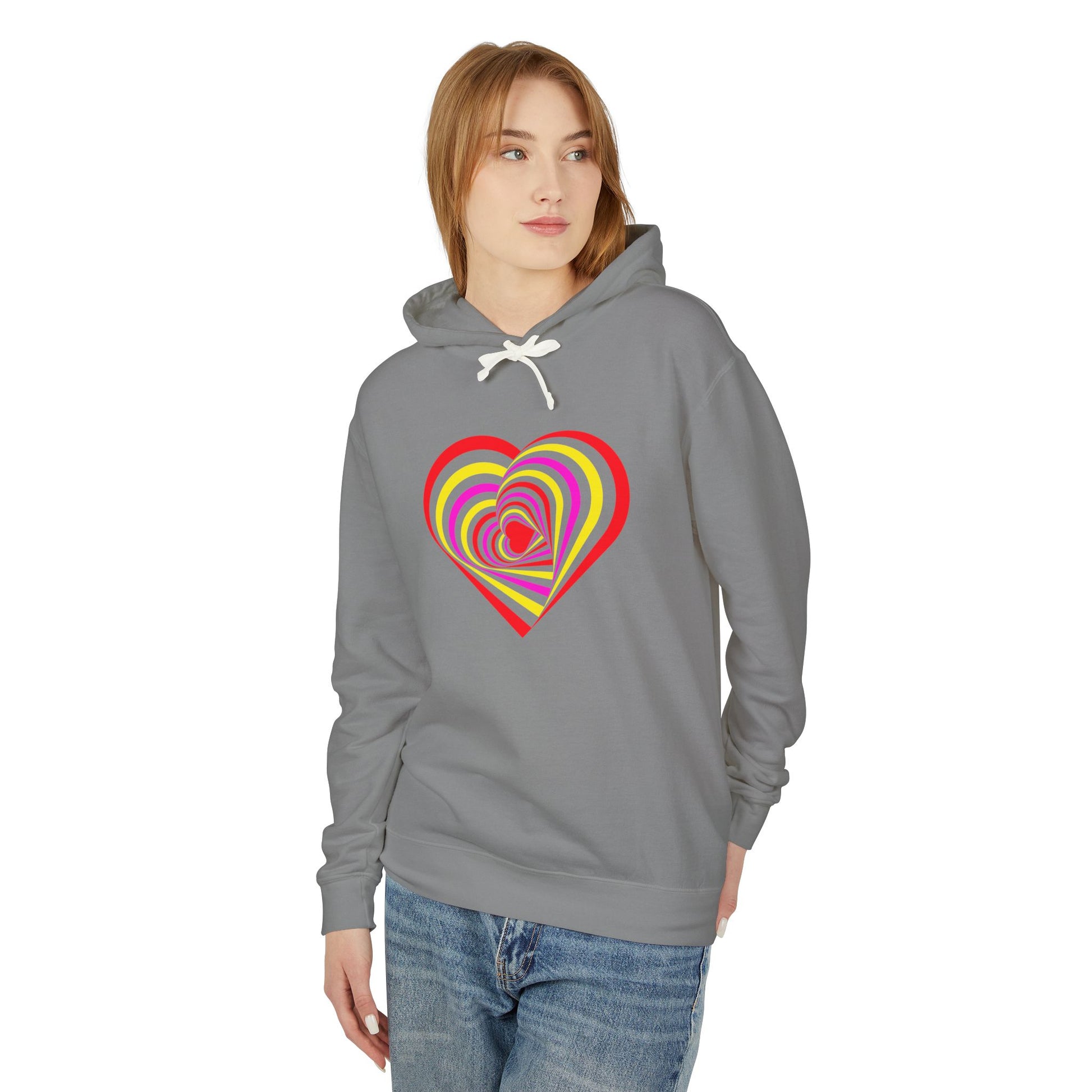 Person wearing a gray hoodie with a colorful heart design on a white background