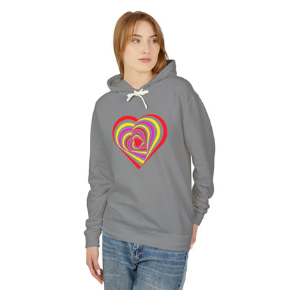 Person wearing a gray hoodie with a colorful heart design on a white background