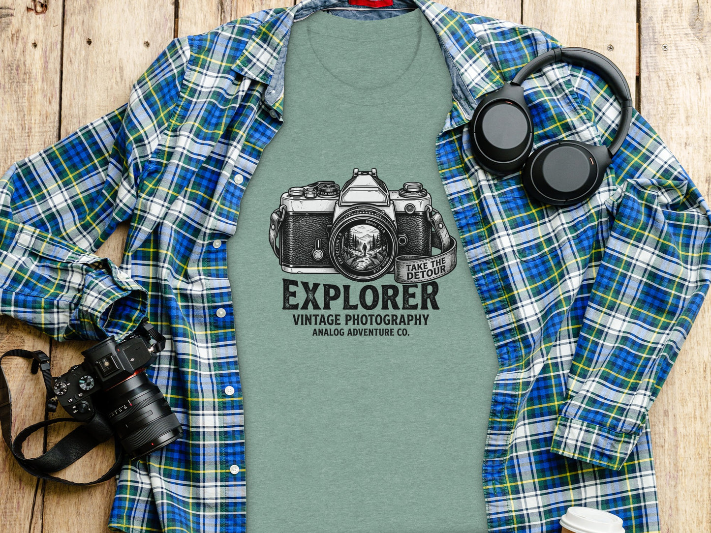 The Analog Explorer's Detour: Backcountry Outpost Shirt: Green t-shirt with "EXPLORER VINTAGE PHOTOGRAPHY ANALOG ADVENTURE CO." text and camera graphic.