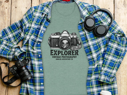 The Analog Explorer's Detour: Backcountry Outpost Shirt: Green t-shirt with "EXPLORER VINTAGE PHOTOGRAPHY ANALOG ADVENTURE CO." text and camera graphic.