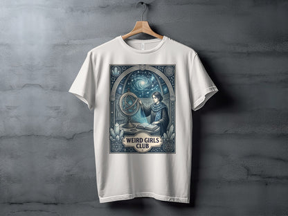 White t-shirt with "Weird Girls Club" logo featuring woman with celestial globe.