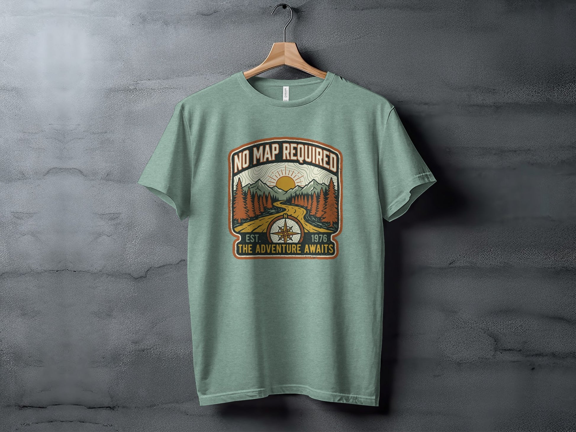 Heritage No Map Required: The Adventure Awaits Nomad Tee: Green t-shirt with "No Map Required" graphic and "The Adventure Awaits" text.