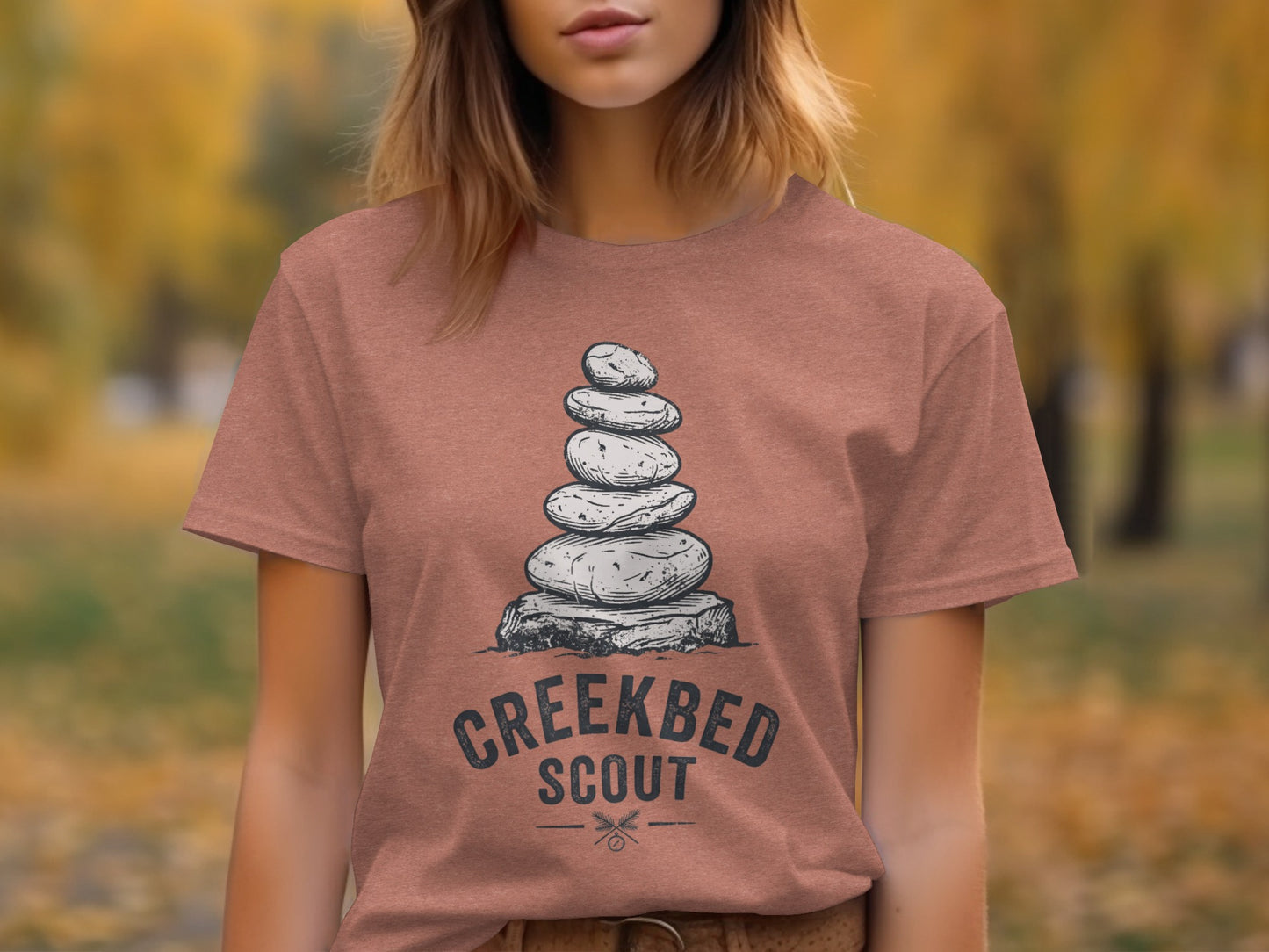 Creekbed Scout Cairn Graphic: The Explorer's Adventure Tee: T-shirt with stacked stones and "CREEKBED SCOUT" text.