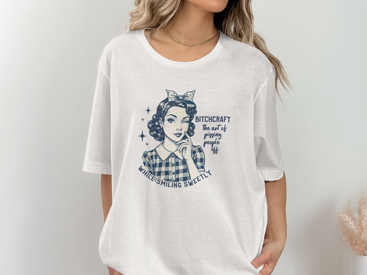 Bitchcraft While Smiling Sweetly Graphic T-shirt