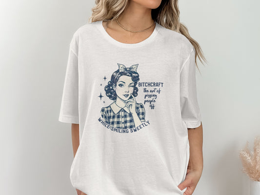 Bitchcraft While Smiling Sweetly Graphic T-shirt