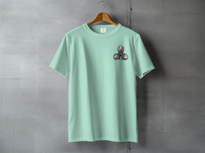 Mint green t-shirt with a fidget spinner graphic on the chest.