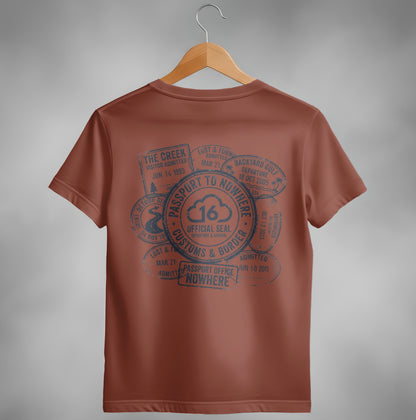 Brown t-shirt with "Passport to Nowhere" design featuring stamps and official seal.
