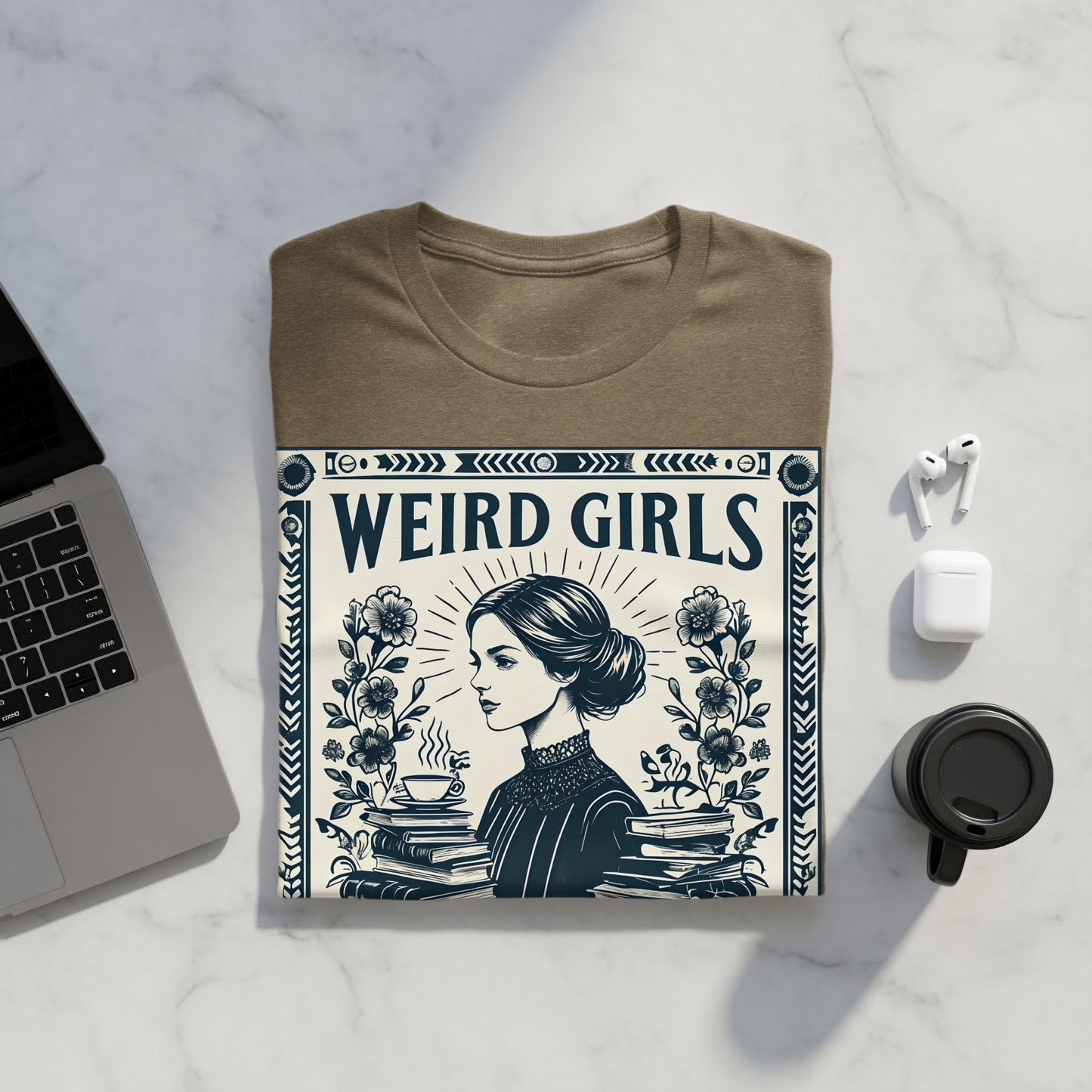 Brown t-shirt with "Weird Girls" text and ornate floral design.