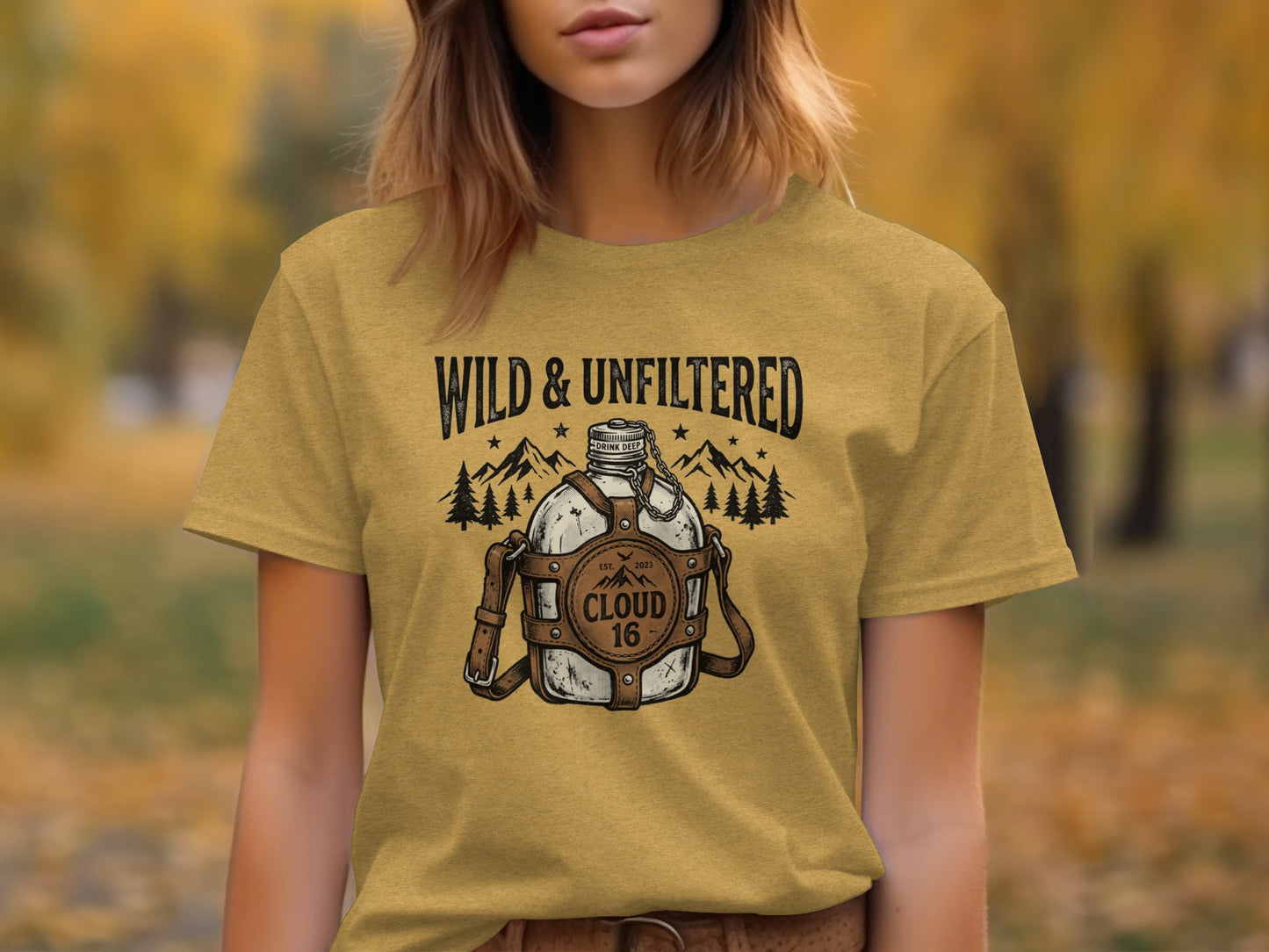 Rugged Wild & Unfiltered Spirit Wilderness Shirt: Mustard t-shirt with a graphic of a canteen, mountains, and text.