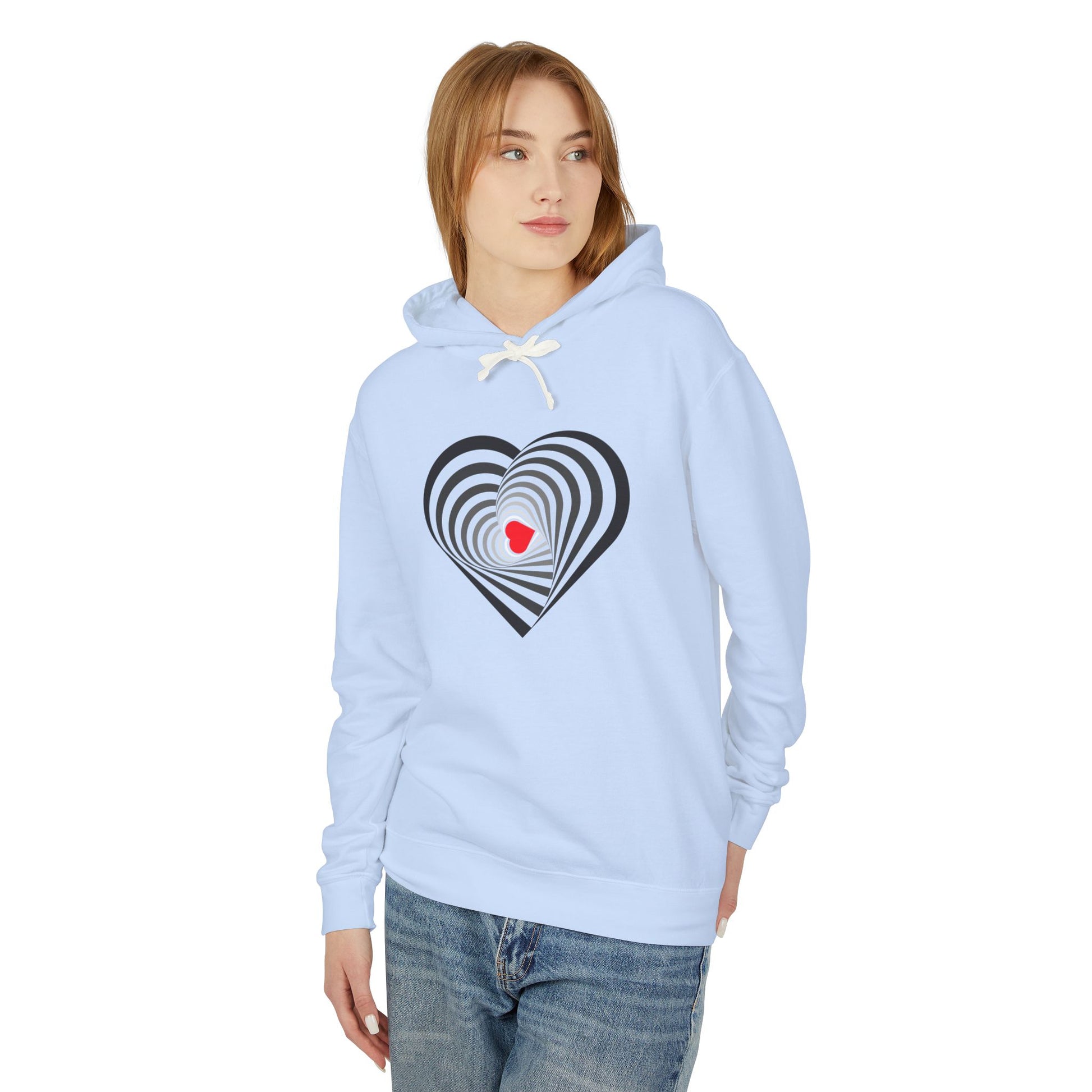 Light blue hoodie with a heart design worn by a person on a white background
