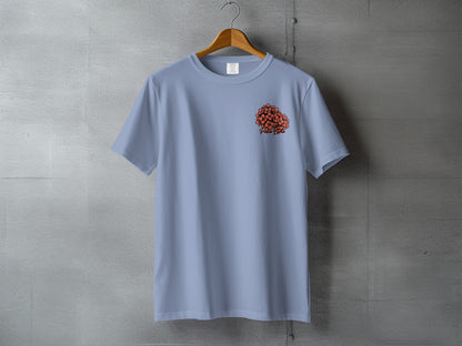 Light blue t-shirt with orange floral graphic and "Pipa Pipa" text on chest.