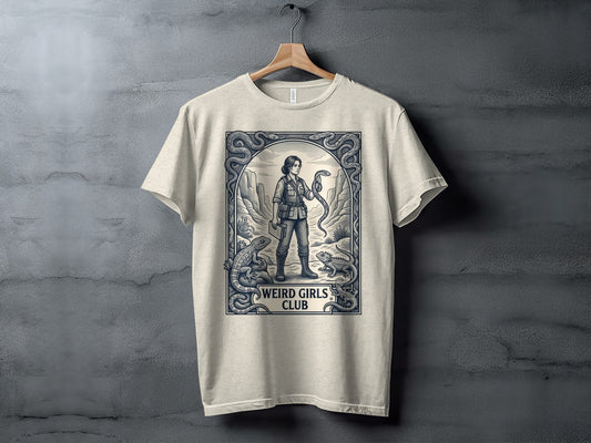 T-shirt with a woman holding a snake, surrounded by snakes and lizards.