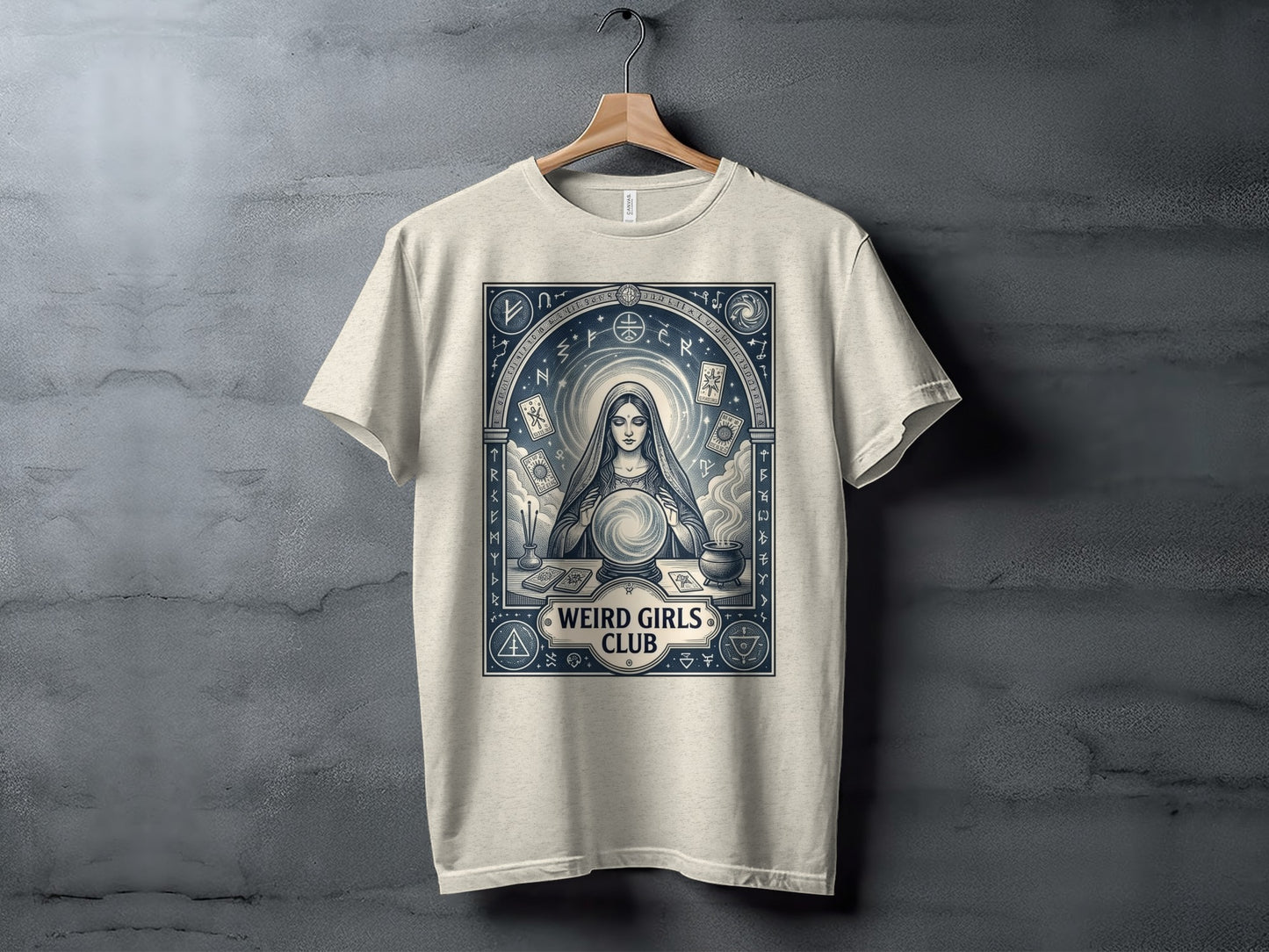 T-shirt with mystical tarot card imagery and "Weird Girls Club" text.