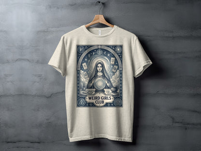 T-shirt with mystical tarot card imagery and "Weird Girls Club" text.