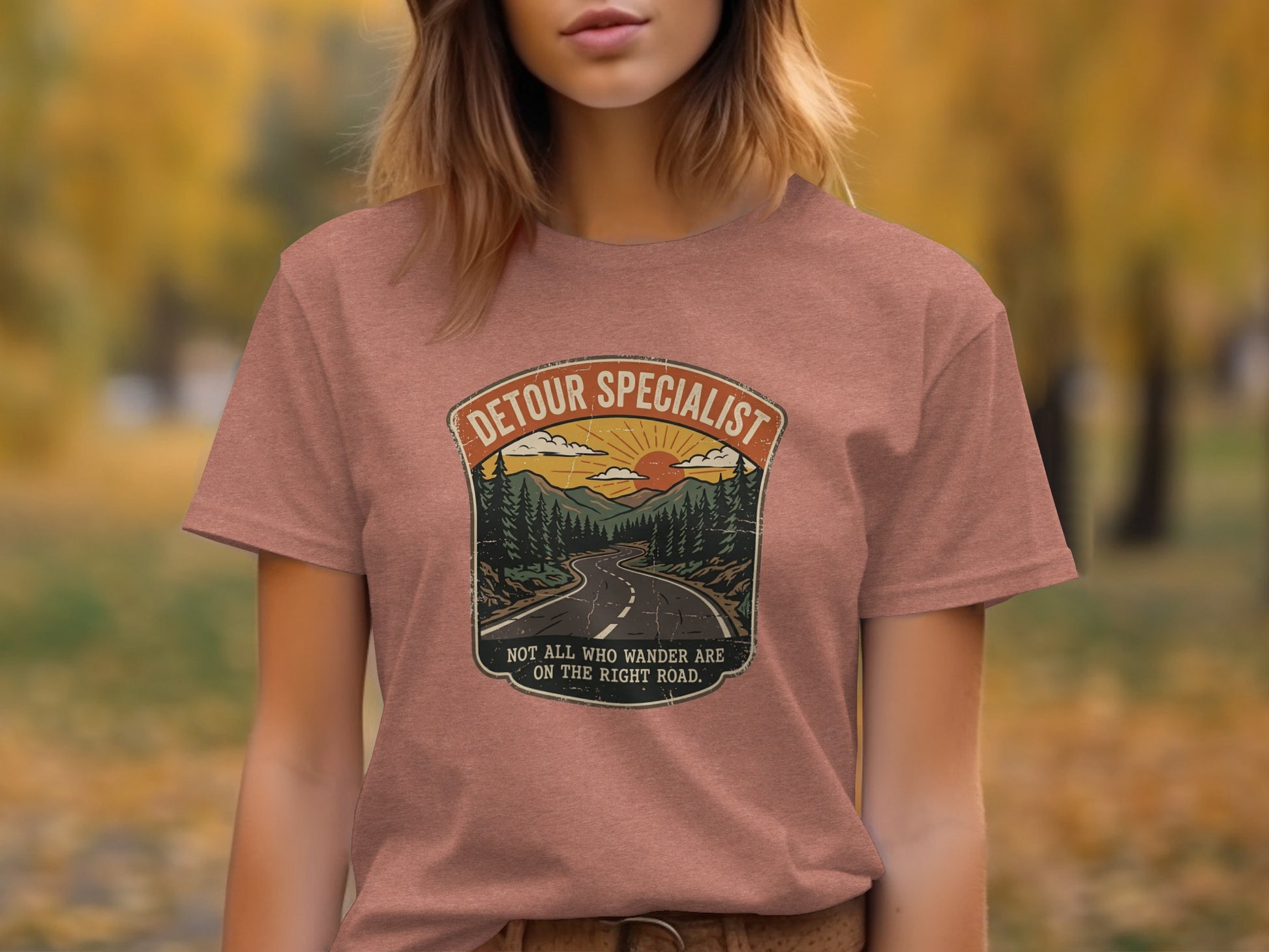 Heritage Detour Specialist Vintage Graphic Nomad Tee: T-shirt with "Detour Specialist" badge and quote "Not all who wander are on the right road."