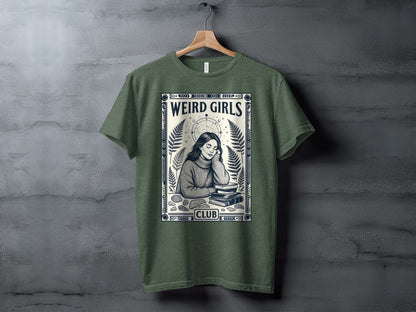 Green t-shirt with "Weird Girls Club" text and illustration of a girl reading.
