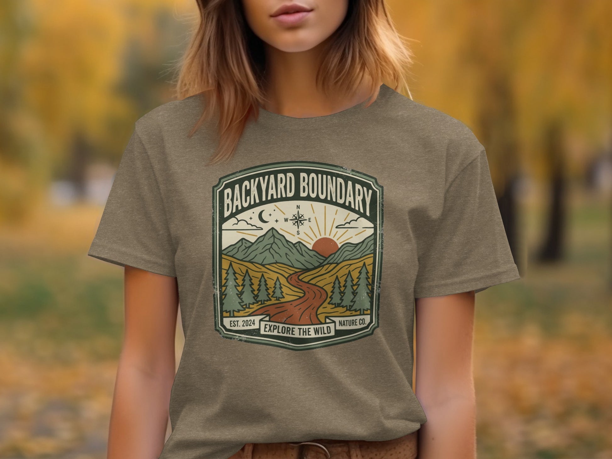 Rugged Backyard Boundary: Explore The Wild Wilderness Shirt: Brown t-shirt with "Backyard Boundary Explore the Wild" graphic.