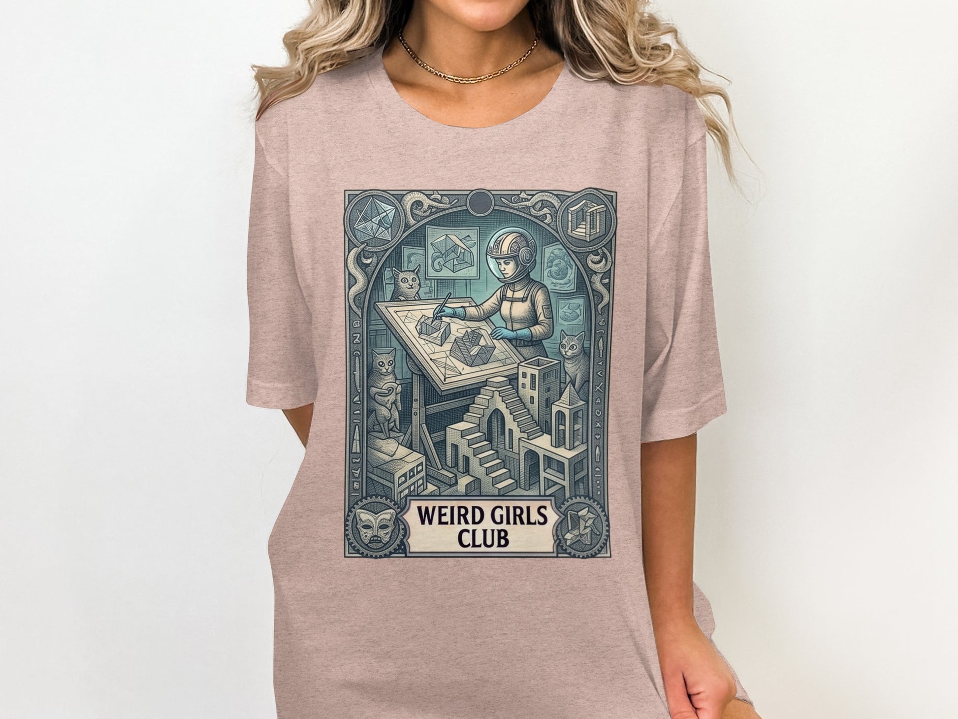 T-shirt with "Weird Girls Club" logo and detailed geometric astronaut illustration.
