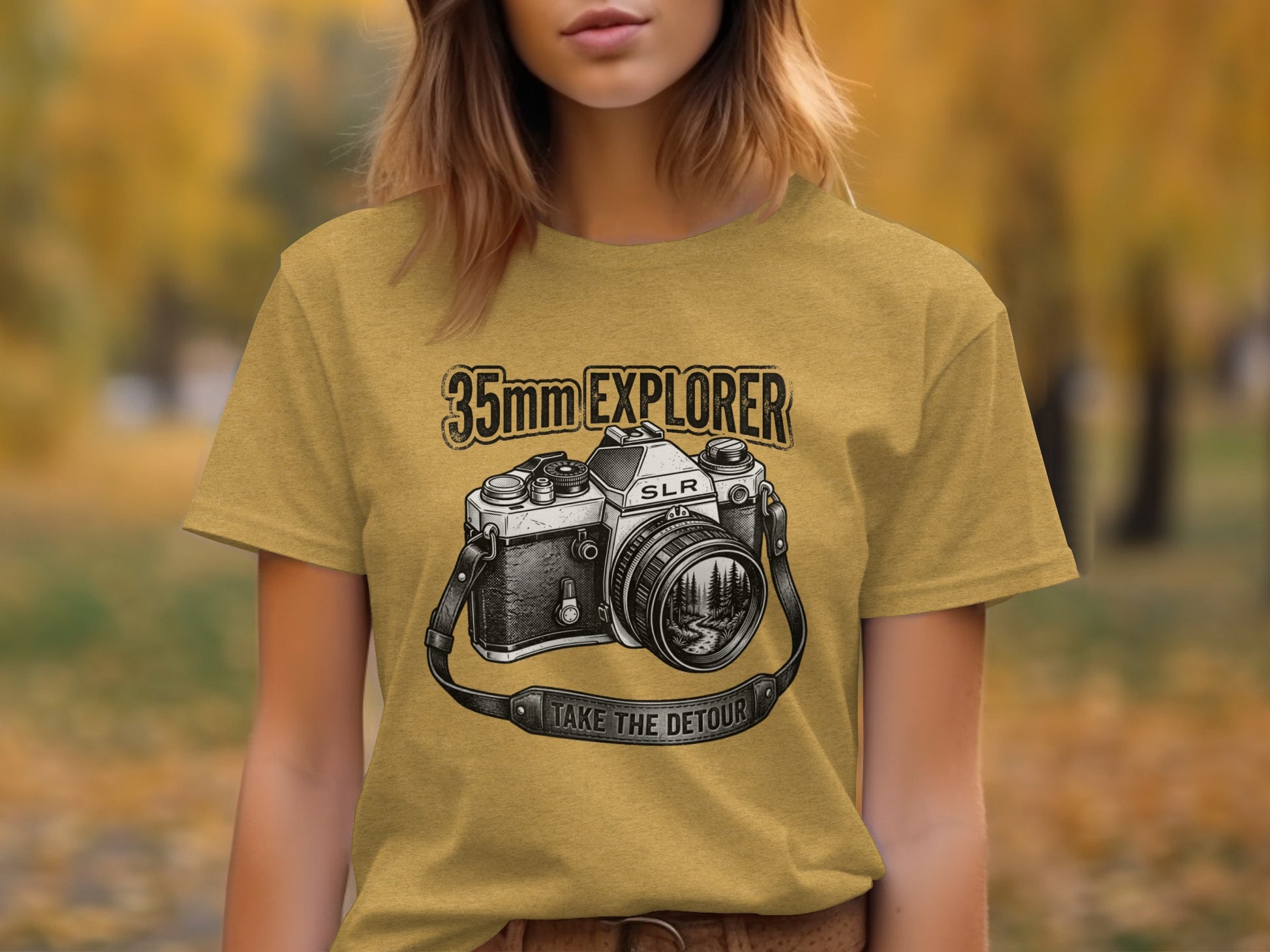 35mm Explorer Detour | Vintage Outdoor Apparel: Yellow t-shirt with 35mm SLR camera graphic and "TAKE THE DETOUR" text.
