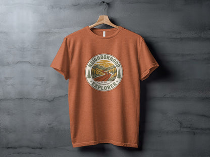 The Original Neighborhood Explorer Adventure Adventure Top: Terracotta t-shirt with circular "Neighborhood Explorer" nature graphic.