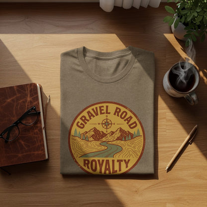 Gravel Road Royalty Adventure Tee | Vintage Outdoor Apparel: T-shirt with "Gravel Road Royalty" emblem featuring mountains, river, and compass rose.