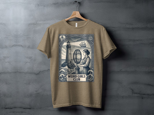 T-shirt graphic of a lighthouse, ship, and woman, with "WEIRD GIRLS CLUB" text.