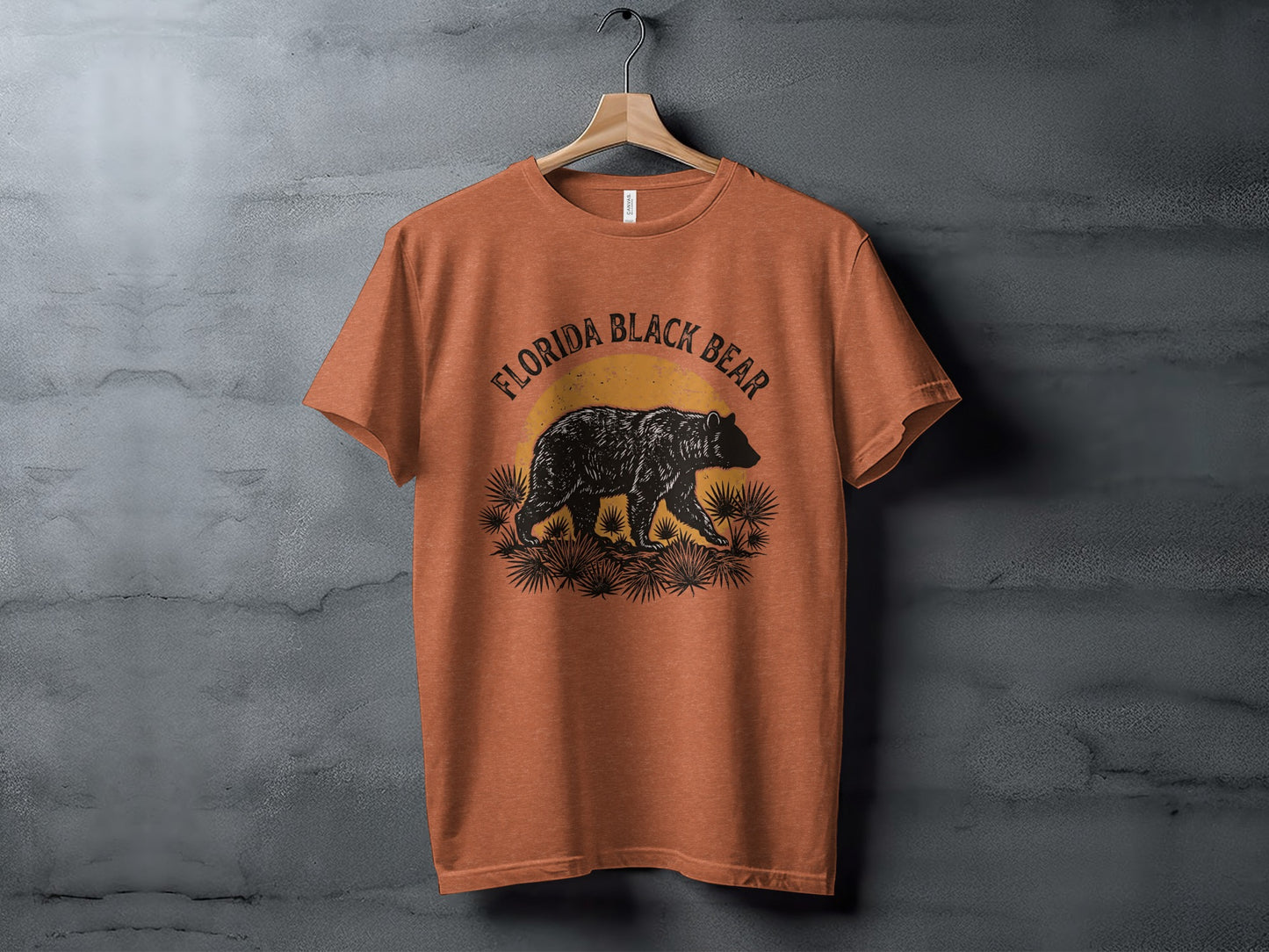 Heritage Florida Bear Trails Classic Nomad Tee: Orange t-shirt with Florida black bear graphic and sunset.