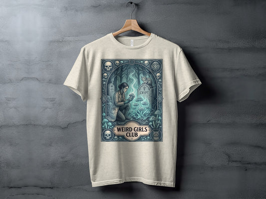 Cream t-shirt with a dark, spooky graphic of a woman and mushrooms.
