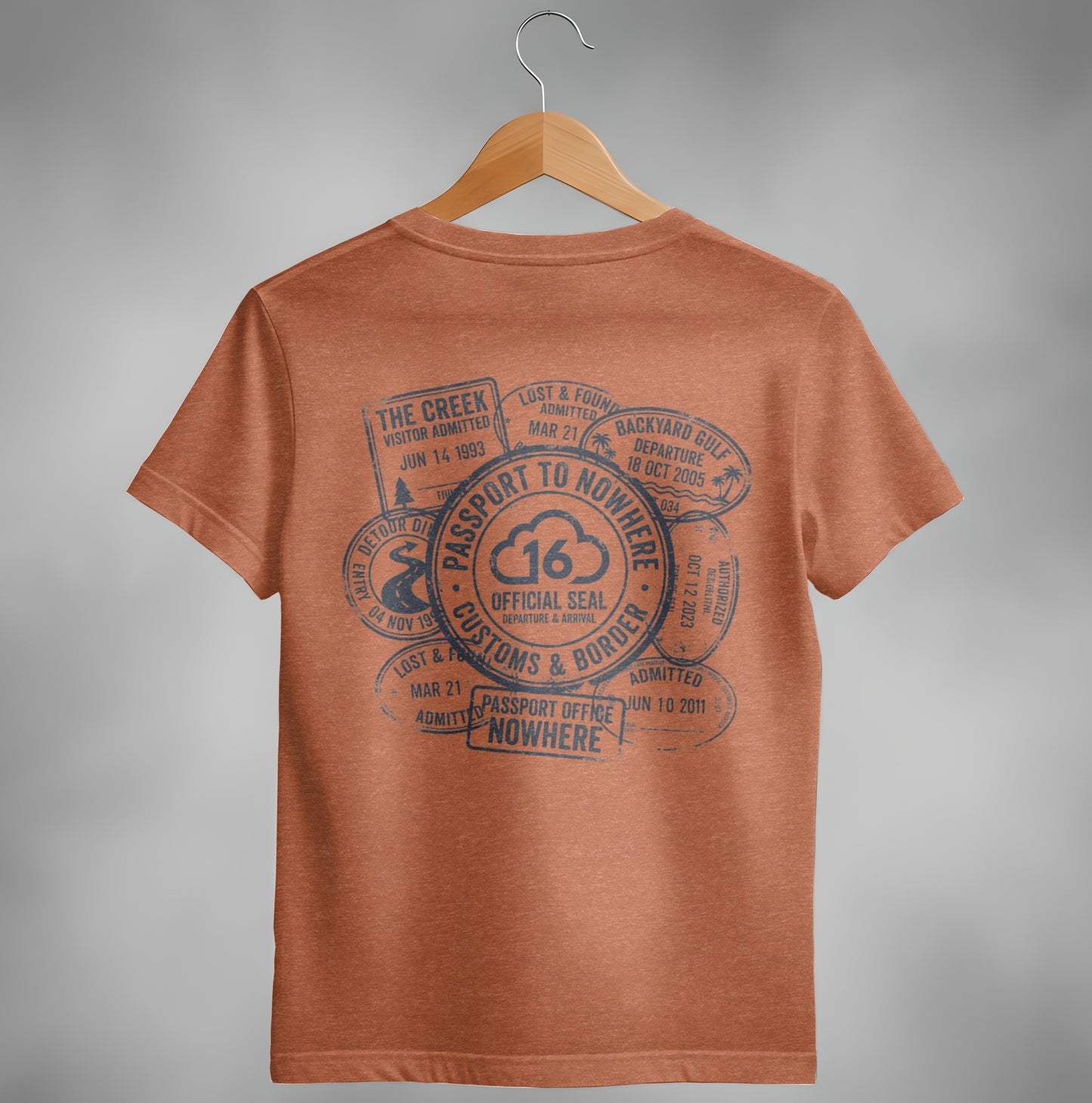 Orange t-shirt with "Passport to Nowhere" stamps and travel details.
