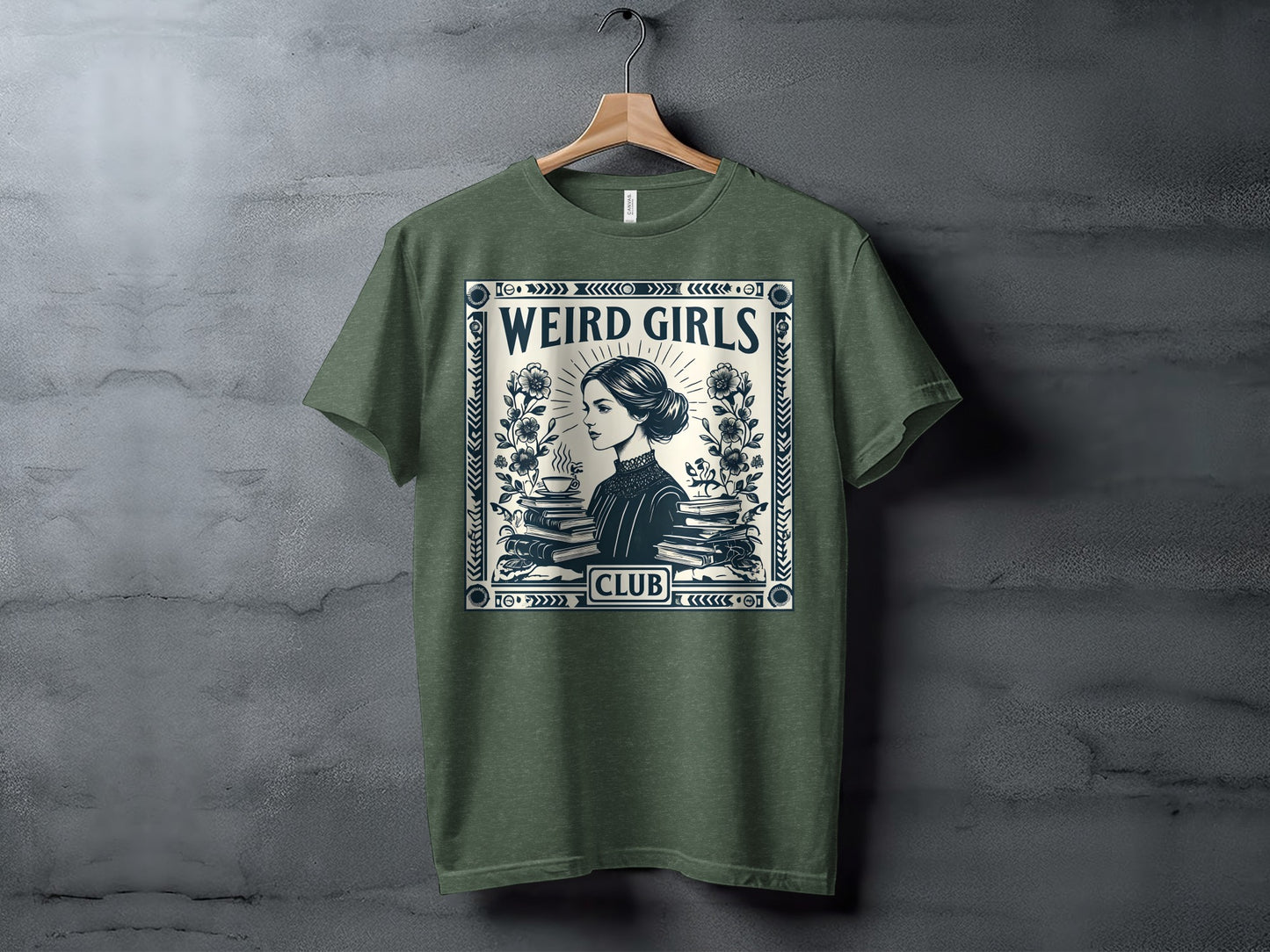 Olive green t-shirt with "Weird Girls Club" text and illustration of a woman with books.