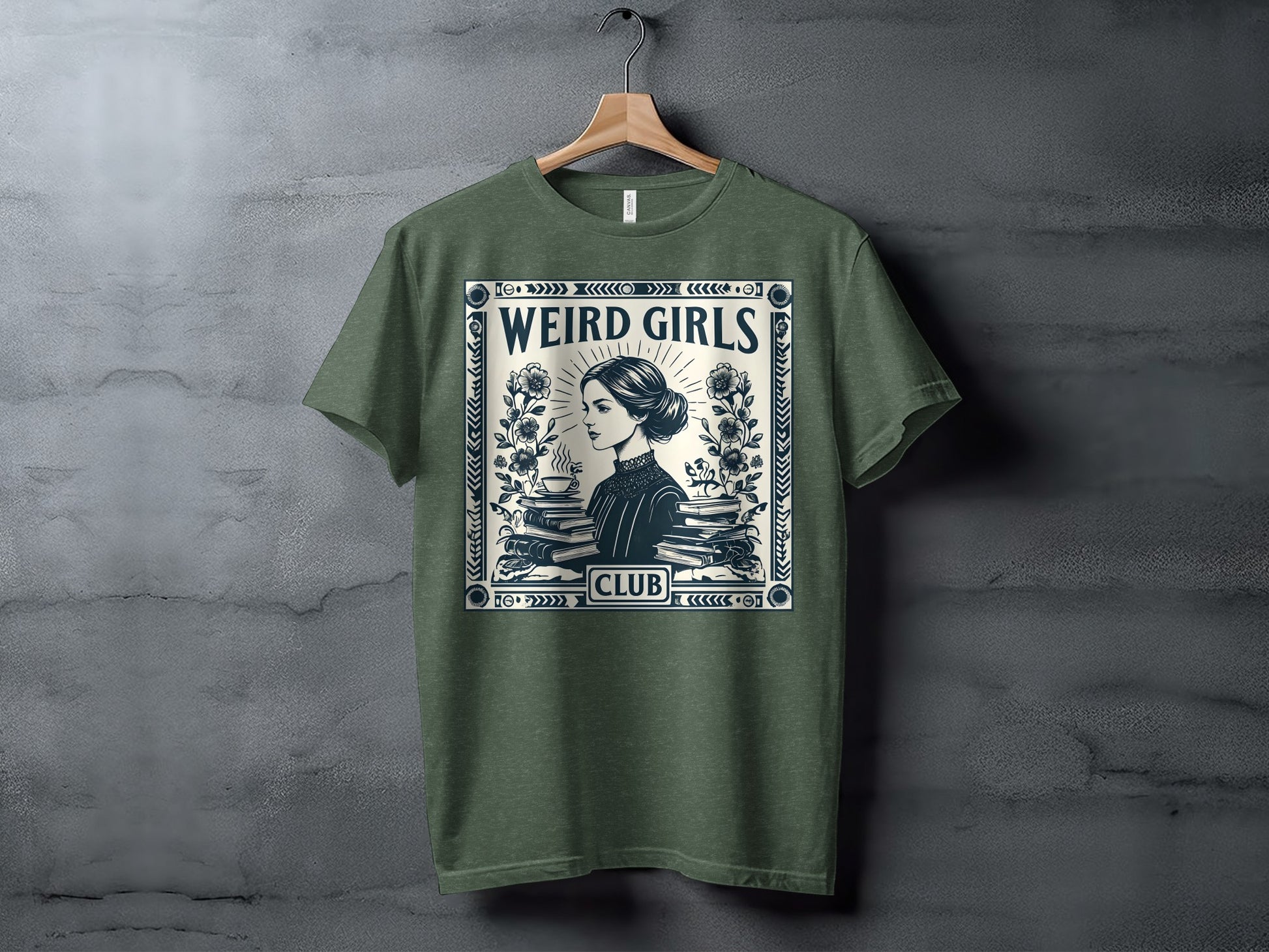 Olive green t-shirt with "Weird Girls Club" text and illustration of a woman with books.