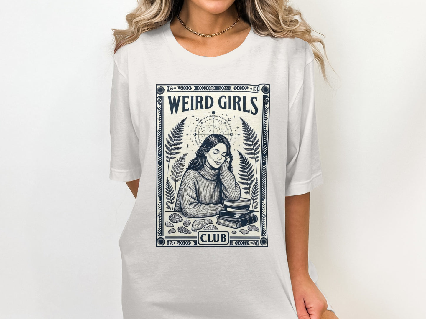White t-shirt with "WEIRD GIRLS CLUB" text and mystical illustration.