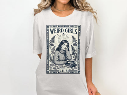 White t-shirt with "WEIRD GIRLS CLUB" text and mystical illustration.