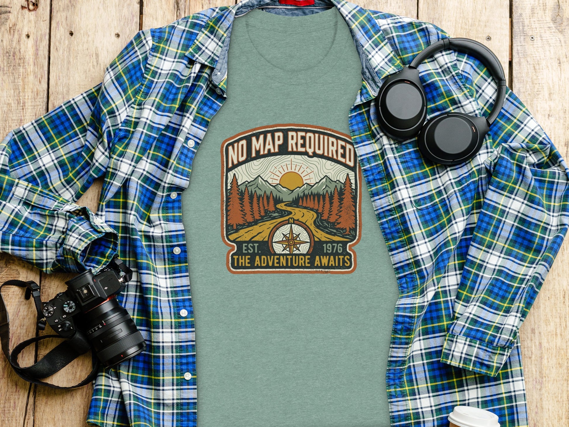 Heritage No Map Required: The Adventure Awaits Nomad Tee: Green t-shirt with "NO MAP REQUIRED THE ADVENTURE AWAITS" mountain graphic.