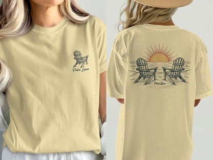 Two Adirondack chairs face a sunset on a beach with Puka Luna logo.