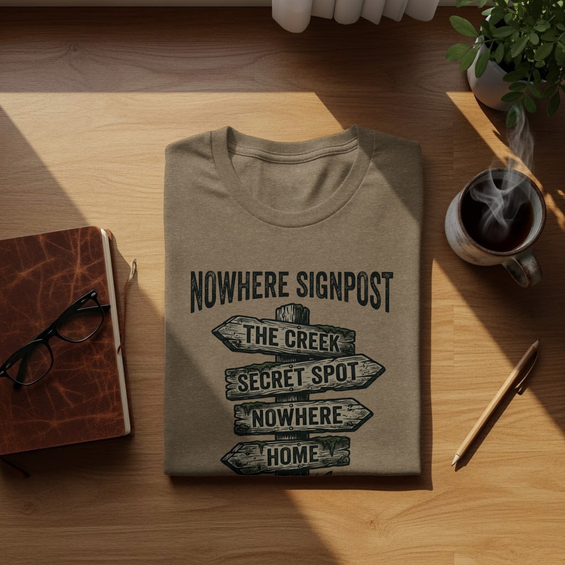 Nowhere Signpost Adventure: Backcountry Outpost Shirt: T-shirt with distressed wooden signpost pointing to The Creek, Secret Spot, Nowhere, and Home.