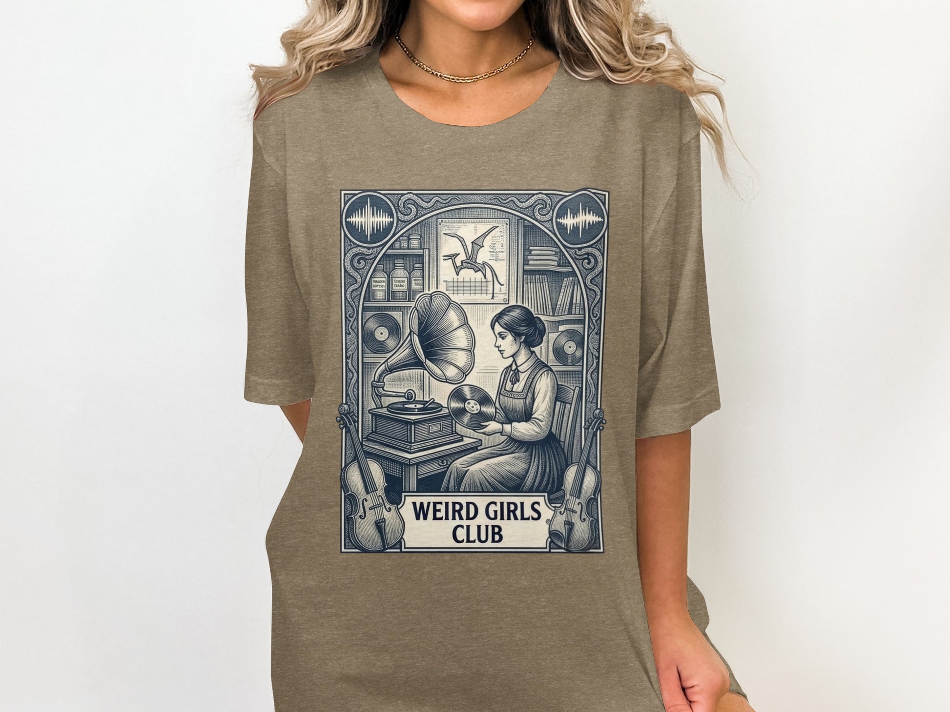 T-shirt with vintage illustration of a woman and gramophone, "Weird Girls Club" text.