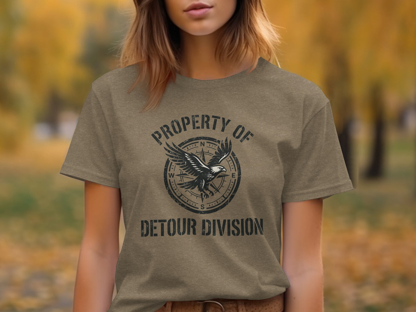Rugged Detour Division Compass Eagle Tee Wilderness Shirt: Brown t-shirt with "Property of Detour Division" and eagle logo.