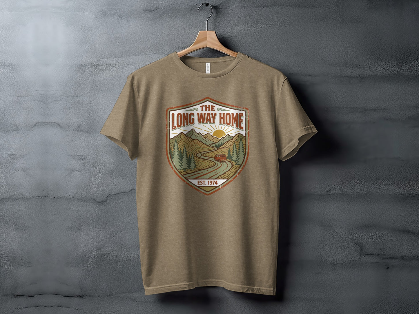 Rugged The Long Way Home | Vintage Adventure Wilderness Shirt: T-shirt featuring a landscape with mountains, a road, and the text "The Long Way Home" and "Est. 1974".
