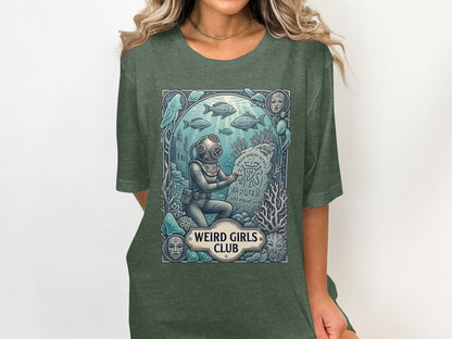 Diver with vintage helmet and text "WEIRD GIRLS CLUB" on a t-shirt.