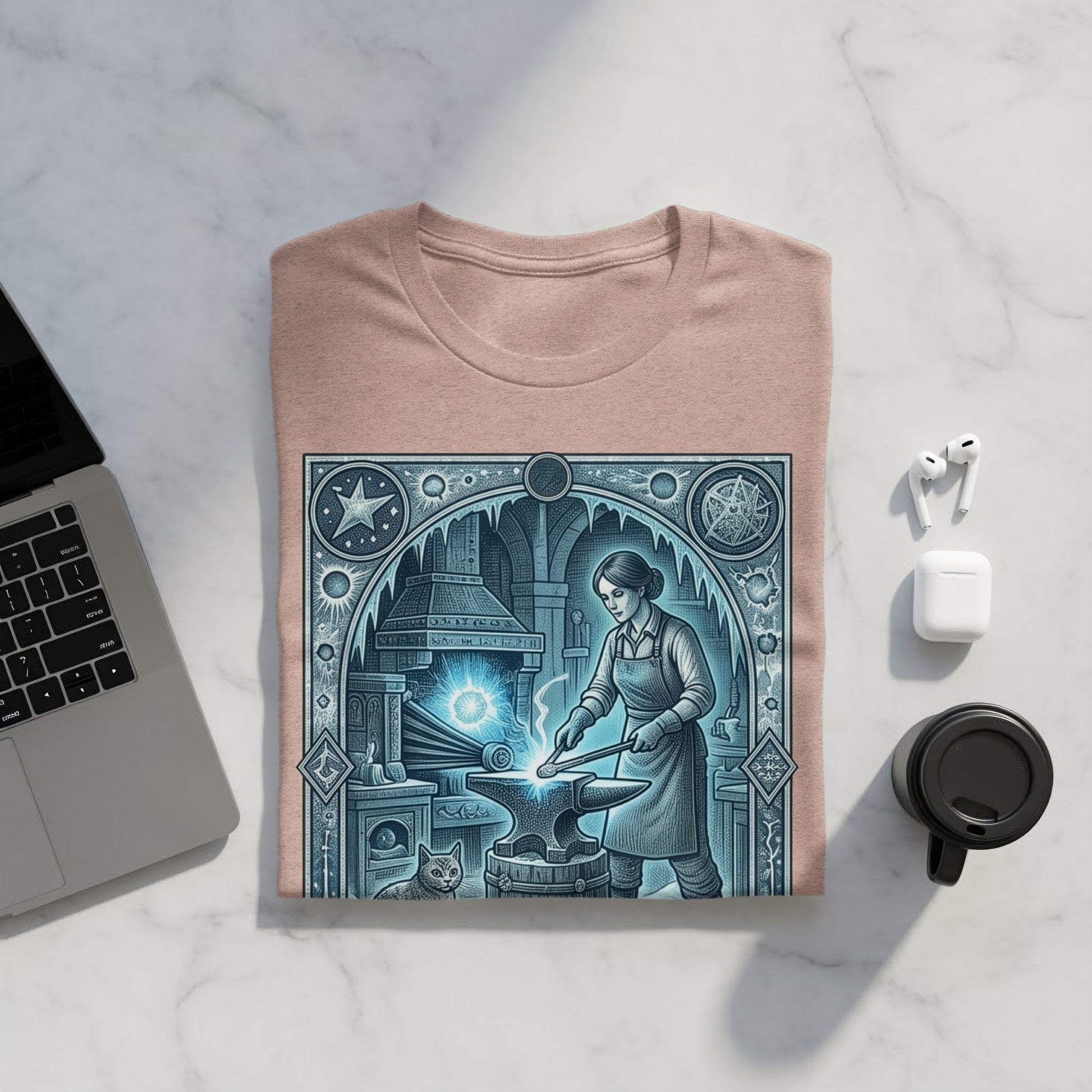 T-shirt with a blacksmith working at a forge, cat nearby, and celestial motifs.