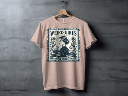 T-shirt with "WEIRD GIRLS CLUB" text and a vintage illustration of a woman reading.
