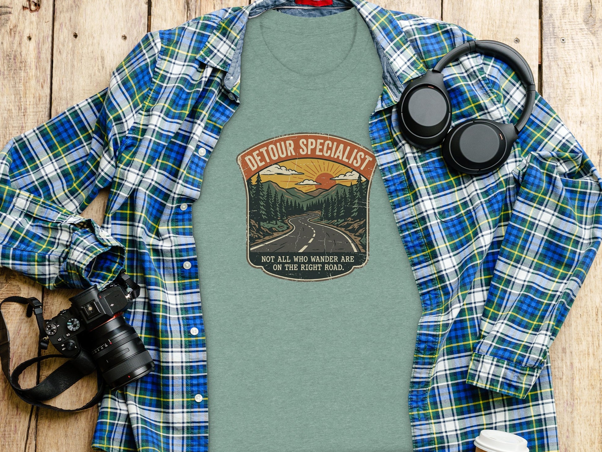 Heritage Detour Specialist Vintage Graphic Nomad Tee: Green t-shirt with "Detour Specialist" text and mountain landscape graphic.