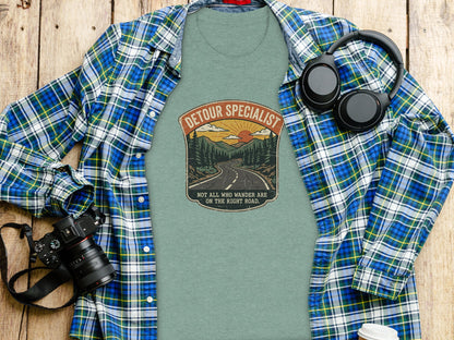 Heritage Detour Specialist Vintage Graphic Nomad Tee: Green t-shirt with "Detour Specialist" text and mountain landscape graphic.