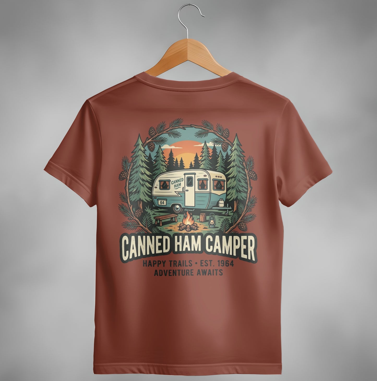 T-shirt featuring a vintage camper scene with "Canned Ham Camper" text.