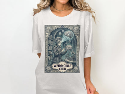 White t-shirt with "Weird Girls Club" graphic featuring a woman with a brain and gears.