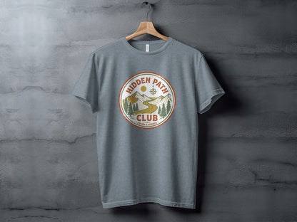 Rugged Hidden Path Club Explorer Wilderness Shirt: Grey t-shirt with Hidden Path Club logo featuring mountains, trees, and winding path.