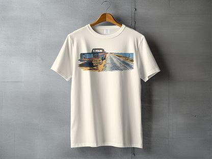 T-shirt with illustration of antique truck and "FRESH CRAB" sign by a road.